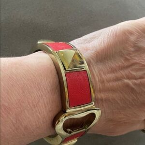 SPIKED bracelet WITH NON-FUNCTIONAL BOTTLE OPENER DESIGN